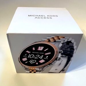 Michael Kors access watch. Original box with charger and extra links.